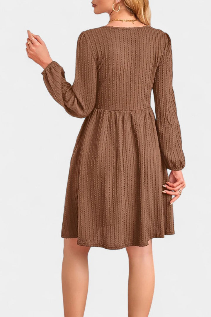 Dorothée Textured Flared Dress featuring Round Neck and Long Sleeves